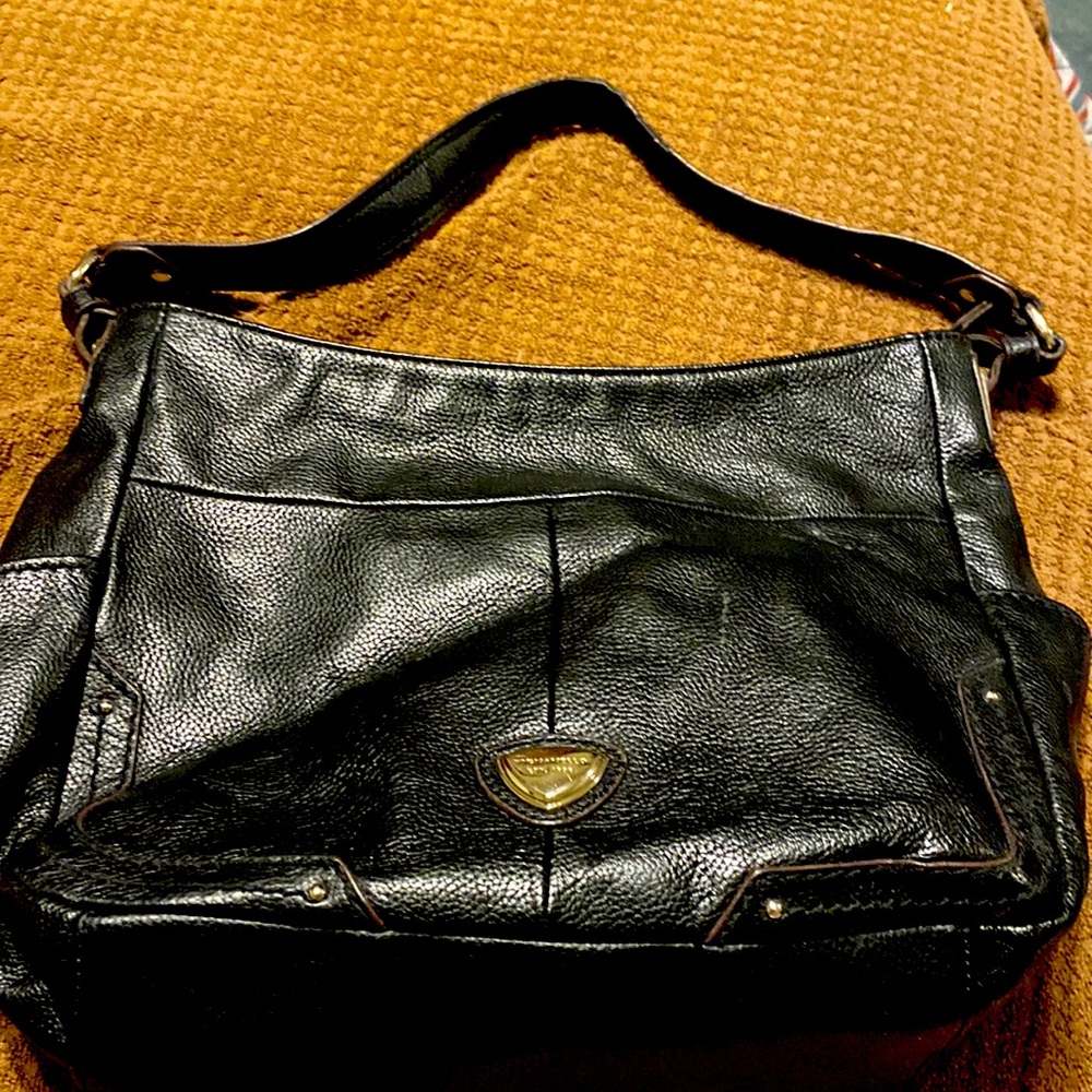 Tiganello Black Medium sized purse. Leather with lots of hidey holes. Pretty